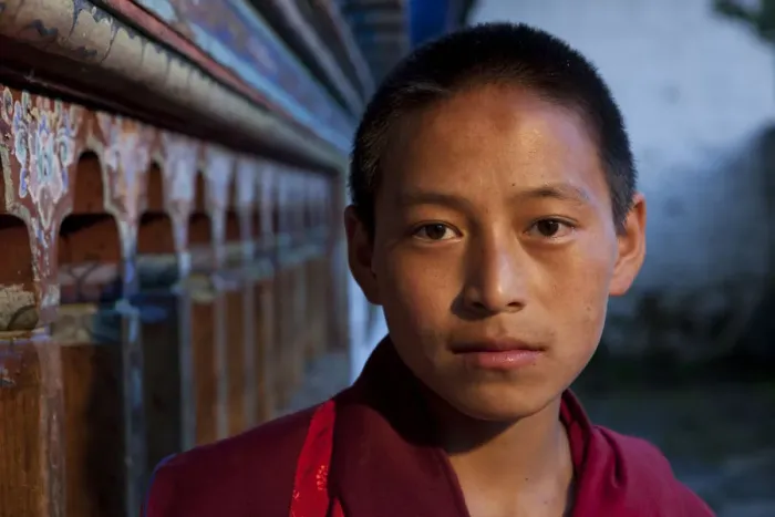 Framed Print : A young monk at the blue palace in Wangdue, Bhutan Framed Print : A young monk at the blue palace in Wangdue, Bhutan