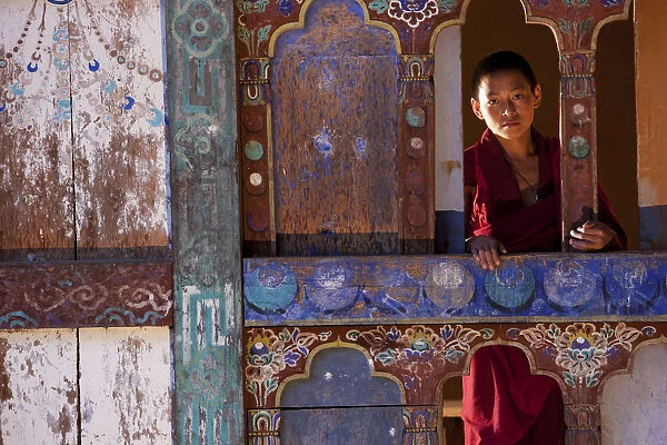 A young monk at the blue palace in Wangdue, Bhutan