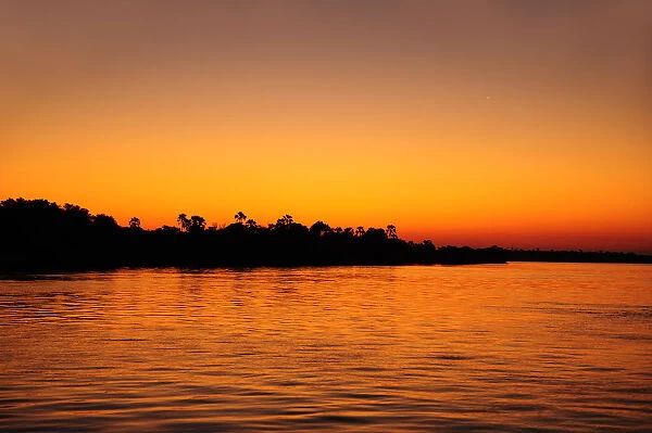 Zambezi River at sunset, near Victoria Falls, Zimbabwe, Africa