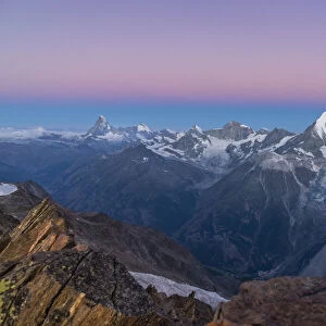 The 4000 peaks of Zermatt valley just before sunrise from Nadelgrat