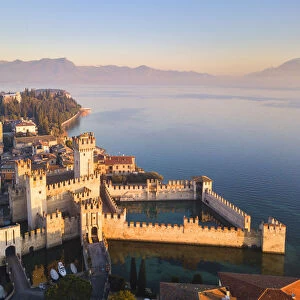 Aerial view at dawn of Sirmione village in Garda lake, Lombardy district