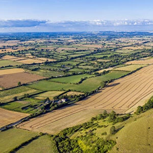 Aerial view of the famous White Horse below Bratton Camp, an Iron Age hillfort near