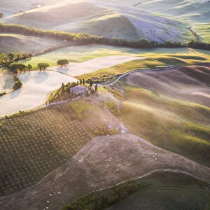 Aerial view of farmhouse and fields, Tuscany, Italy