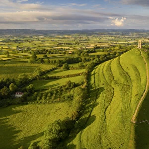 Aerial view of Glastonbury on a sunny summer evening, Somerset, England