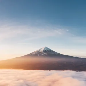 Aerial view of Mt Fuji and sea of fog at sunrise, Yamanashi Prefecture, Japan