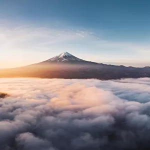Aerial view of Mt Fuji and sea of fog at sunrise, Yamanashi Prefecture, Japan