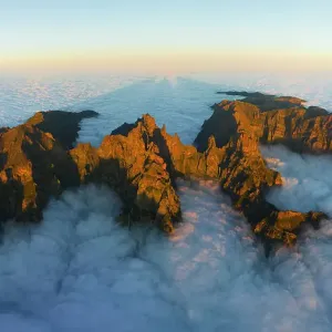 aerial view of Pico do Arieriro during a warm spring sunset, Madeira, Portugal aerial view of Pico do Arieriro during a warm spring sunset, Madeira, Portugal