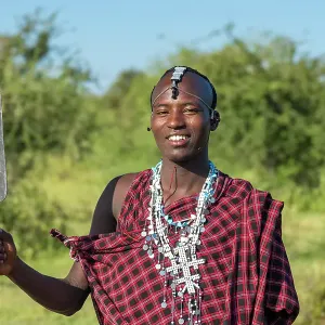 africa, Tanzania, Manyara Region. A young Maasai Warrior posing with his spear africa, Tanzania, Manyara Region. A young Maasai Warrior posing with his spear