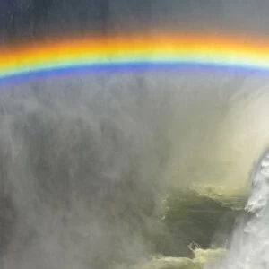 Africa, Zambia. The Victoria Falls with the rainbow