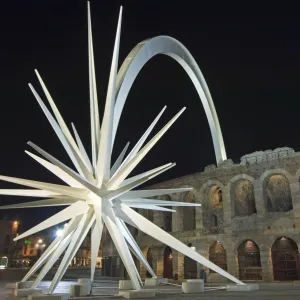 Amphitheatre and shooting star monument at night