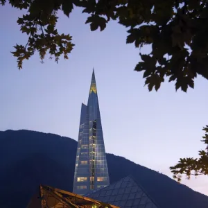 Andorra Andorra La Vella Hot Spring Complex Caldea lit up in the evening