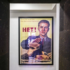 Armenia, Yerevan, send up of Soviet-era poster urging comrades NOT to eat American food