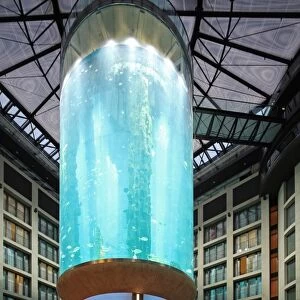 Atrium of the DomAquar e Hotel with a massive aquarium in the middle. Berlin, Germany
