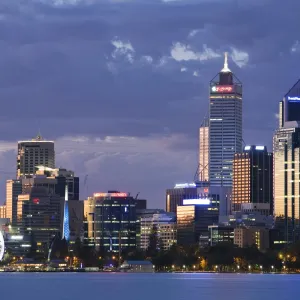 Australia, Western Australia, Perth. The Swan River and city skyline at dusk