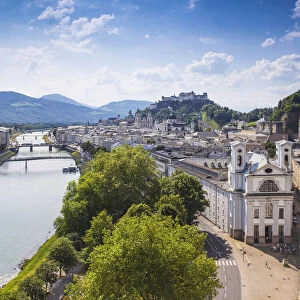 Austria, Salzburg, View of Salzach River and Hohensalzburg Castle above The Old City