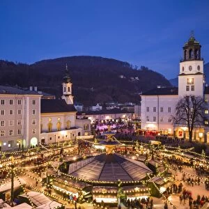 Austria, Salzburgerland, Salzburg, Christmas Market, Residenzplatz, elevated view, dusk