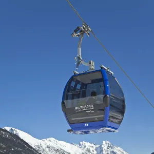 Austria, Tirol. St. Anton am Arlberg, Gondola over the lower resort slopes