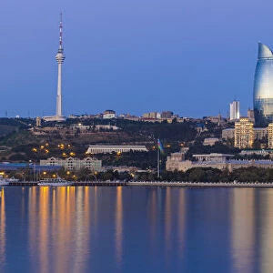 Azerbaijan, Baku, View of the Flame Towers reflecting in the Caspian Sea