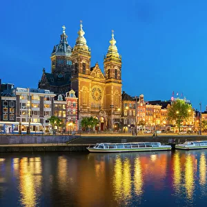 Basilica of Saint Nicholas church at twilight, Amsterdam, Netherlands