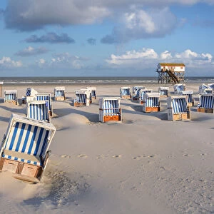 Beach chairs and Stilt house at beach, Sankt Peter-Ording, North Sea, North Frisia