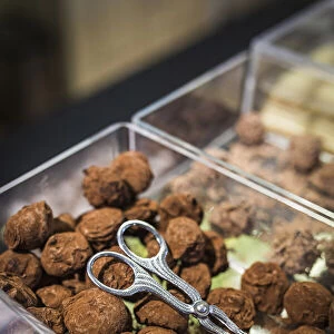 Belgium, Flanders, Ghent, Chocolate truffles in a stand of the Christmas market in