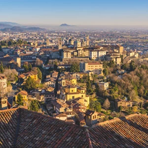 Bergamo, Lombardy, Italy. High angle view over Upper Town (Citta Alta) at sunset