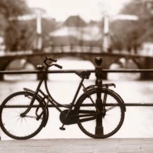 Bike on bridge & Canal, Amsterdam, Holland