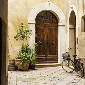Bike in Courtyard, Pienza, Tuscany, Italy