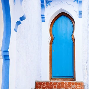 Blue-washed doors and streets of Chefchaouen, Morocco