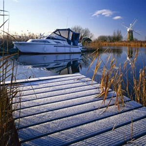 Boat Dock in Frost, River Thurne, Norfolk Broads National Park, Norfolk, England