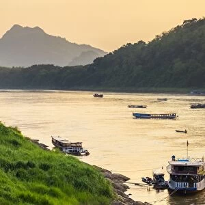 Boats on the Mekong River in late afternoon, Luang Prabang, Louangphabang Province, Laos