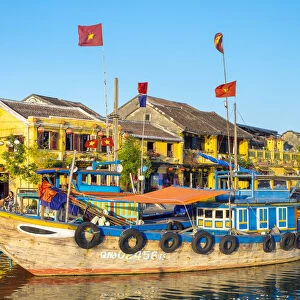 Boats on the Thu Bon River in front of Hoi An Ancient Town, Hoi An, Quang Nam Province