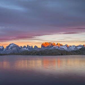 Brenta Dolomites at sunset in a cloud day with Black lake