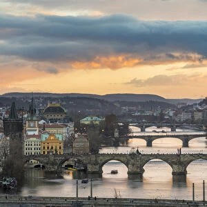 Bridges over Vltava river against sky seen from Letna park at sunset, Prague, Bohemia