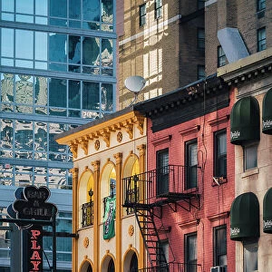 Building with fire escapes, Manhattan, New York City, USA, North America