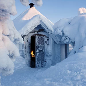 Cabin covered by snow. Ruuhitunturi, Lapland, Finland