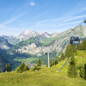 Cable car on way to Oeschinensee lake with Kandersteg in background, Bernese Oberland