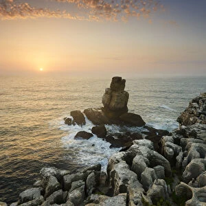 Cabo Carvoeiro and Nau dos Corvos at sunset, in front of the Atlantic Ocean. Peniche