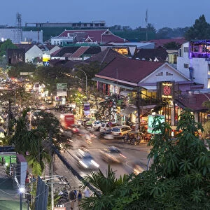 Cambodia, Siem Reap, evening traffic on Sivatha Street, high angle view
