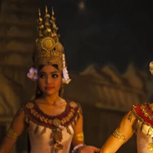 Cambodia, Siem Reap Province, Siem Reap. Traditional Apsara dancers giving an evening