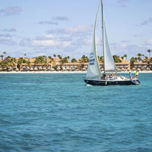Caribbean, Aruba, Oranjestad, A sail boat in the area of Druif Beach