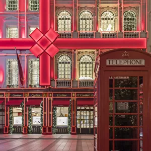 The Cartier shop on Old Bond Street illuminated at night, London