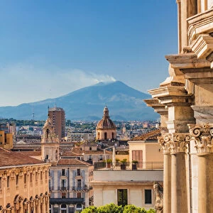 Catania, Sicily. Elevated view of the town with Etna volcano in the background