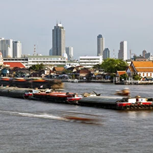 Chao Phraya river and the modern Bangkok skyline, Bangrak district, Bangkok, Thailand
