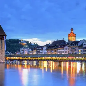 Chapel Bridge and Reuss River at dusk, Lucerne, Switzerland Chapel Bridge and Reuss River at dusk, Lucerne, Switzerland