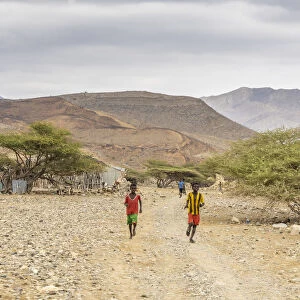 Children running in Melabday ethiopian village, Asso Bhole, Dallol, Danakil Depression
