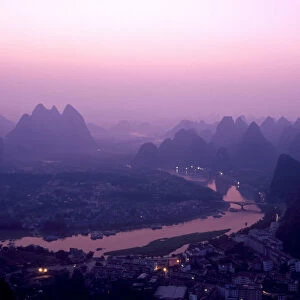 China, Guangxi Province, Yangshuo. The view from above Yangshuo just before sunrise
