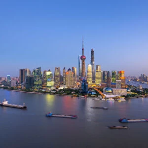 China, Shanghai, Pudong District Skyline across Huangpu River