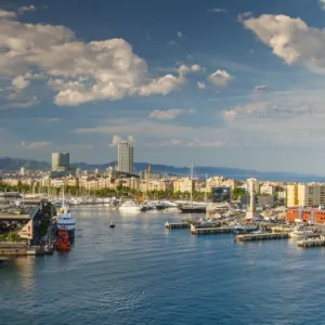 City skyline and Port Vell at sunset, Barcelona, Catalonia, Spain