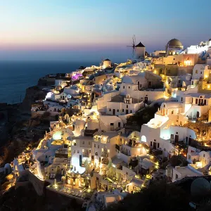 Classic view over Oia at dusk, from the old fort, Santorini, Cyclades Islands, Greece, Europe